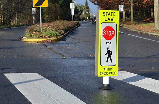 Photograph pedestrian crossing sign